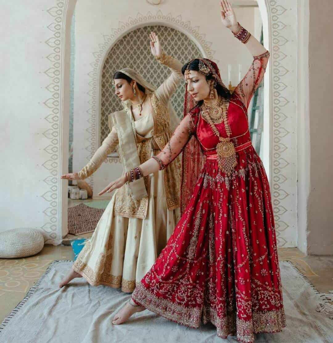 Indian Dance pose by two female dancers.