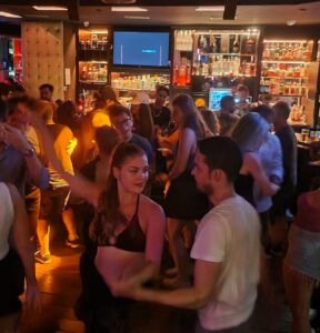 Salsa Dance - Beautiful young girl dancing salsa in a bar in Valencia, Spain